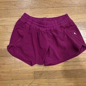 pink lulu lemon tracker short, size 8